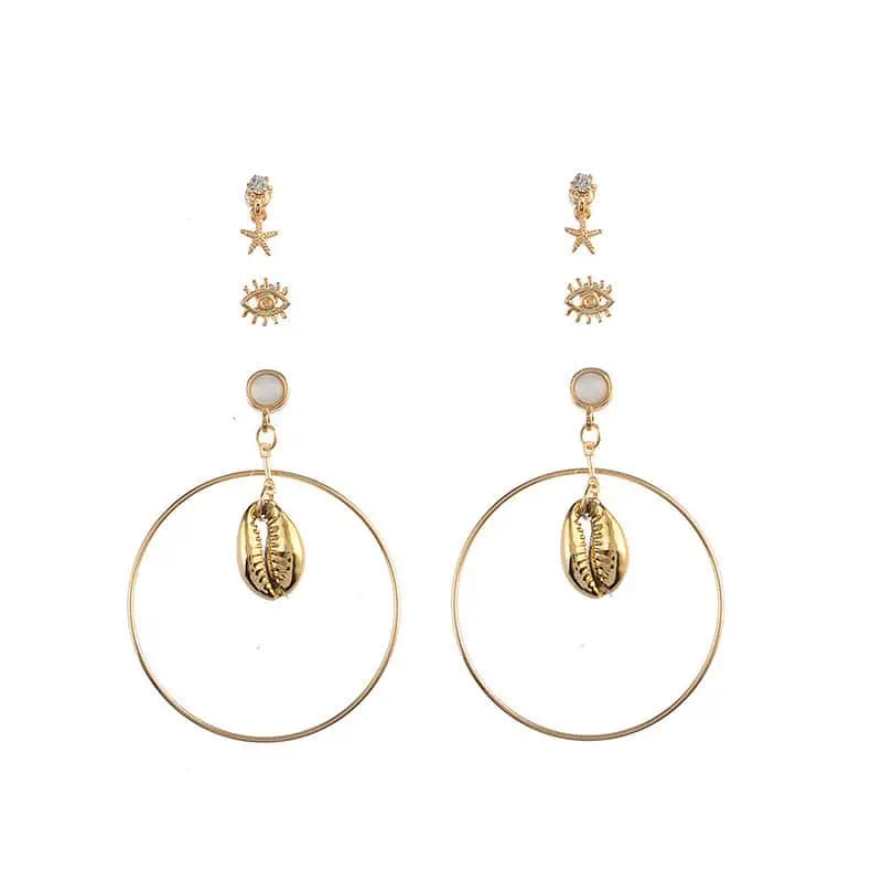Boucles D'Oreilles Coquillages Créoles Dorées Avec Cauri – Image 2