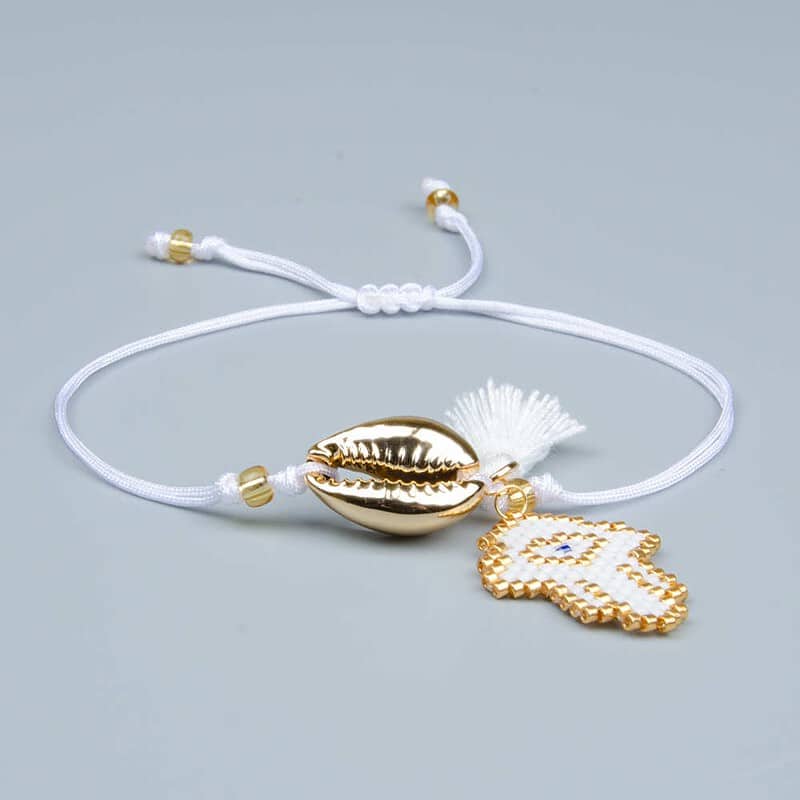 Bracelet Coquillage <br/>Cauri Doré Main de Fatma Blanc