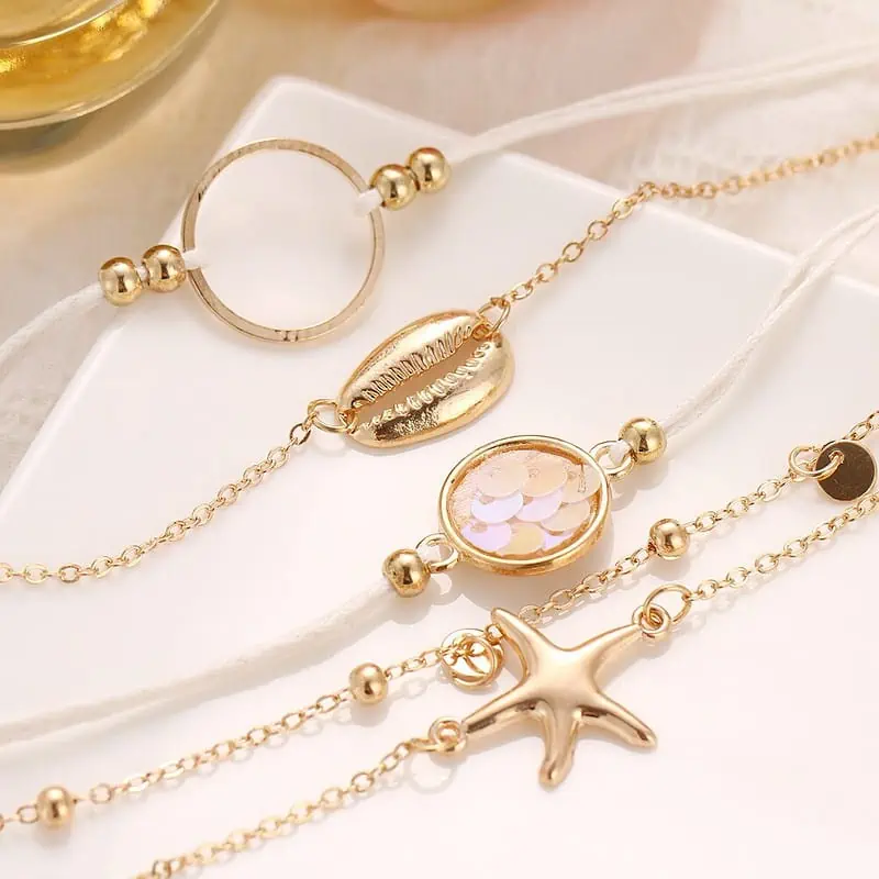 Bracelet Coquillage Multiple Avec Cauri, Étoile De Mer Et Écailles – Image 4